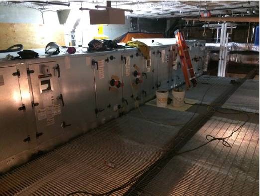 New air handling unit being installed above the first floor outside of Studio One.