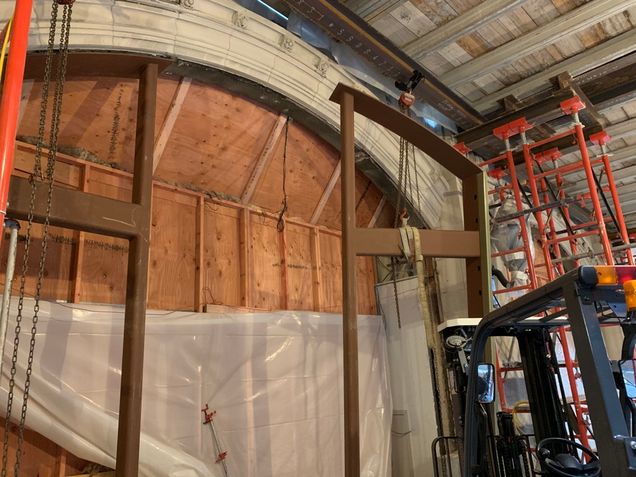 The steel arches being installed along the west alley