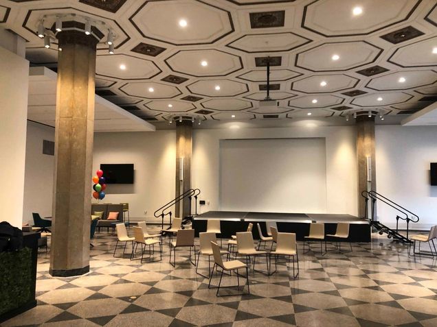 Installation of the stage in the Event space.