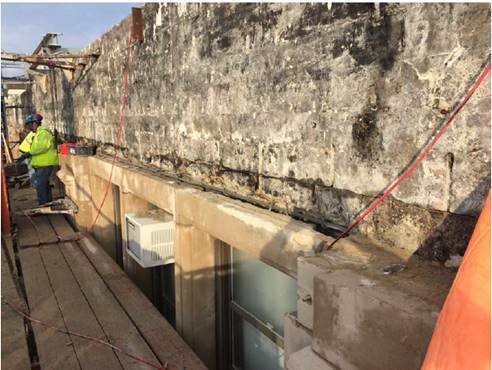 Southwest façade, lintels in place, and rebar coated