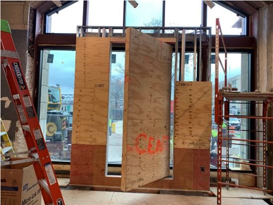 Construction of the display cases in the movement studio has begun