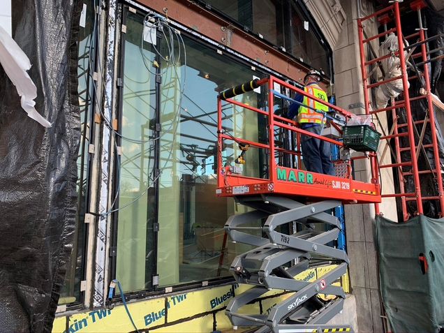 Glass being installed along the south façade