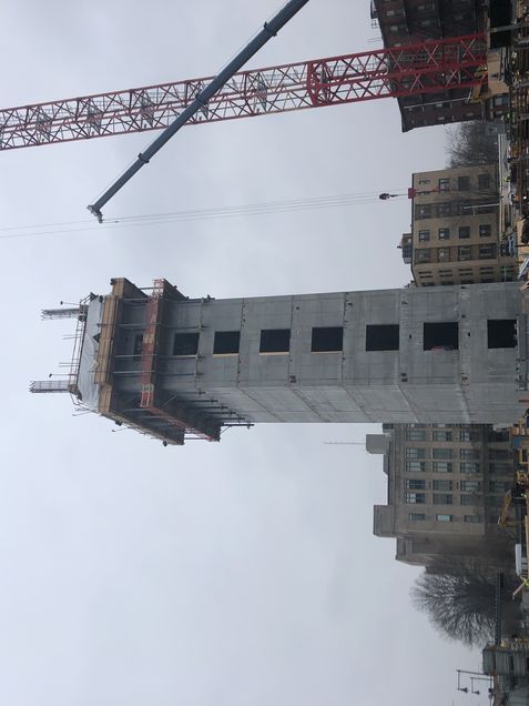 Finalizing rebar & formwork prior to concrete placement at the 9th floor