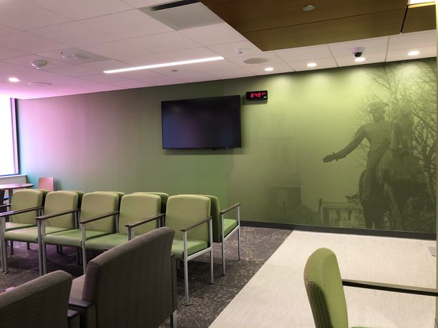 New vinyl wall graphic installed in the sixth-floor patient treatment center reception and waiting area