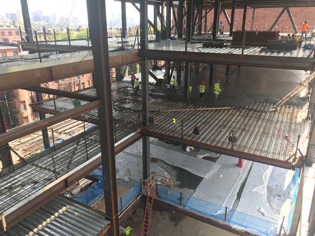 Concrete placement for the podium's 3rd-floor slab on deck
