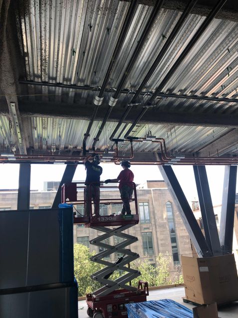 HVAC piping installation at Tower