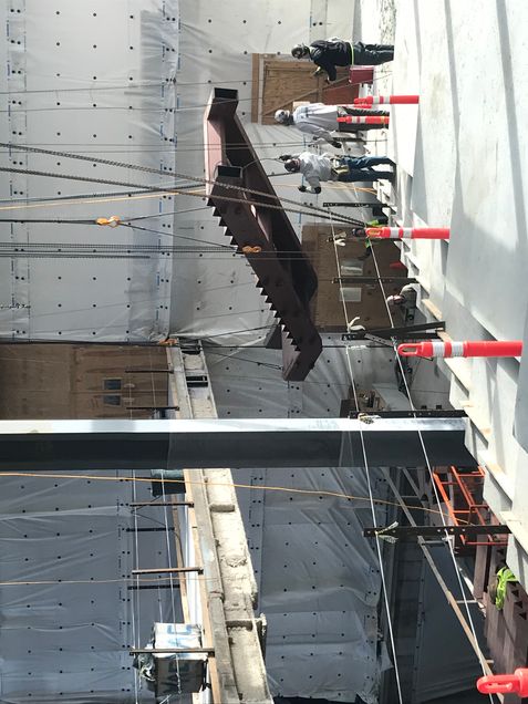 Installing the first section of the monumental stair