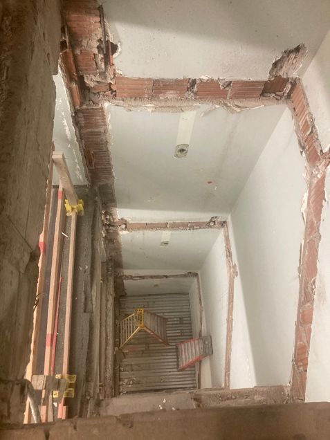 Existing stairwell has been demolished - these locations will be filled in and become a recyclng alcove on each floor
