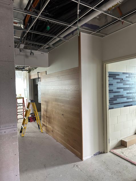 Various wall finishes under way on level 9 reno area