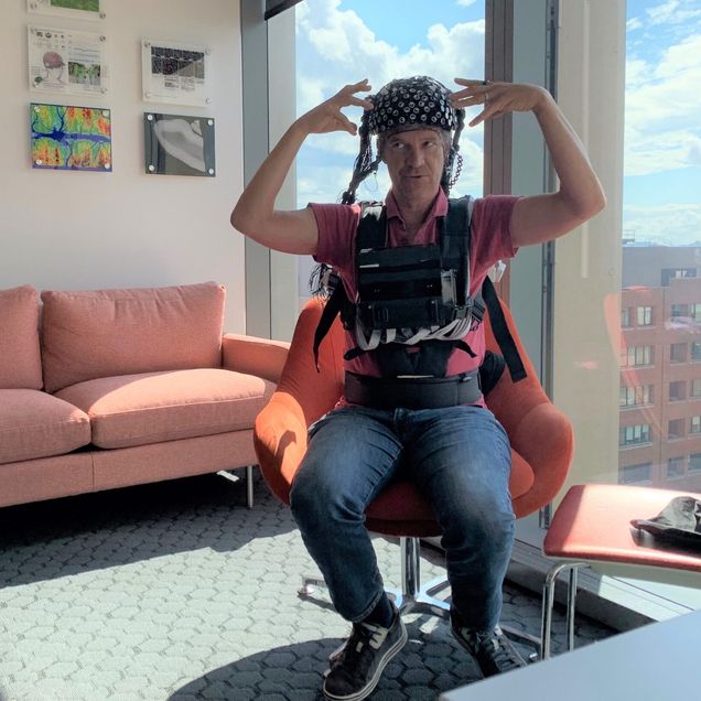 person wearing prototype neuroimaging headgear