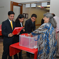 Orientation-200 Director of Admissions Linda Reed signs in new AS 15 students on the first day of orientation