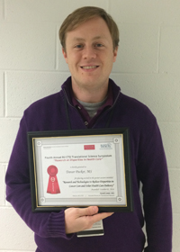 Second place CTSI Symposium poster winner Trevor Packer