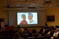Attendees watch a slideshow of International Elective Externships
