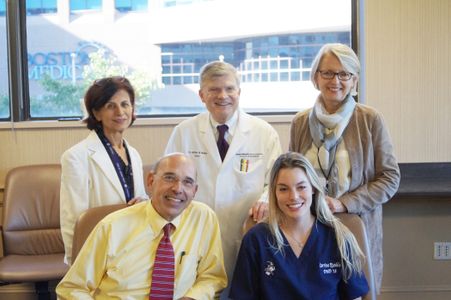 DMD IV student Corinne Kunkle with Drs. Maria A. Kukuruzinska and Raul Garcia, Dean Jeffrey W. Hutter and Afaf Hourani 