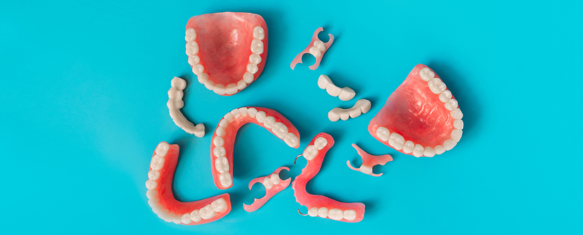 dentures on a blue background