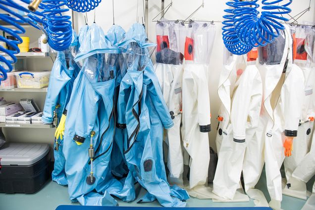 Protective suits hanging at BU’s National Emerging Infectious Diseases Laboratories