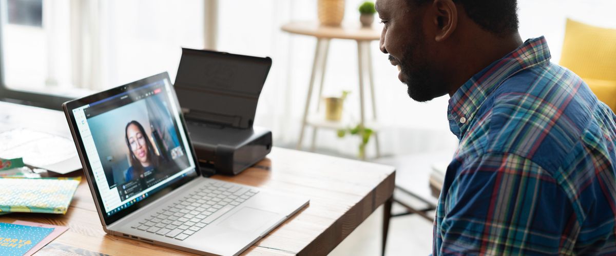 Black person in a virtual meeting