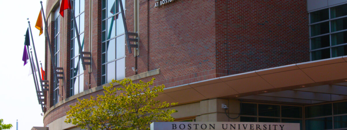 Image of BU's Agganis Arena outside and a sign for the John Hancock Student Village