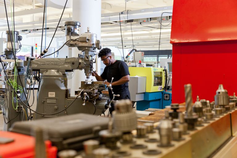 Student working at machine