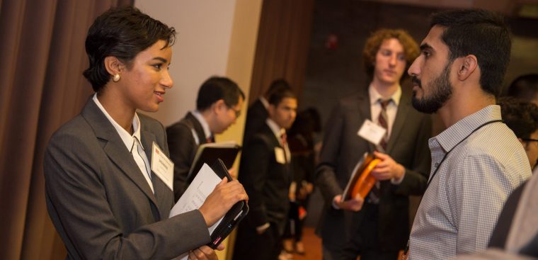 A recruiter chats with a student at the Career Fair