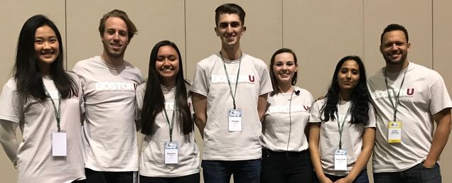 The BostonU Wet Lab Team (from left to right), Shuyi Xu (BME ’19), Stephen Tucker (BME ’20), Madeline Simota (BME ’20), Thomas Costa (BME ’18), Abigail Sasdelli (BME ’18,. and Saimrunali Dadigagla (BME ’20), with Associate Professor Douglas Densmore (ECE, BME) at the iGEM Jamboree.