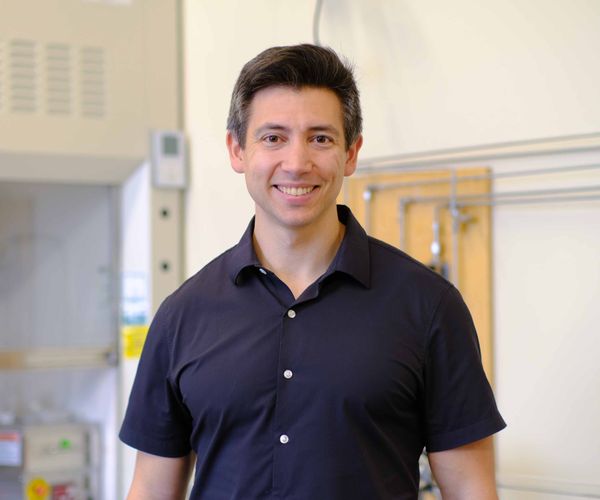 Sean Lubner standing in his lab