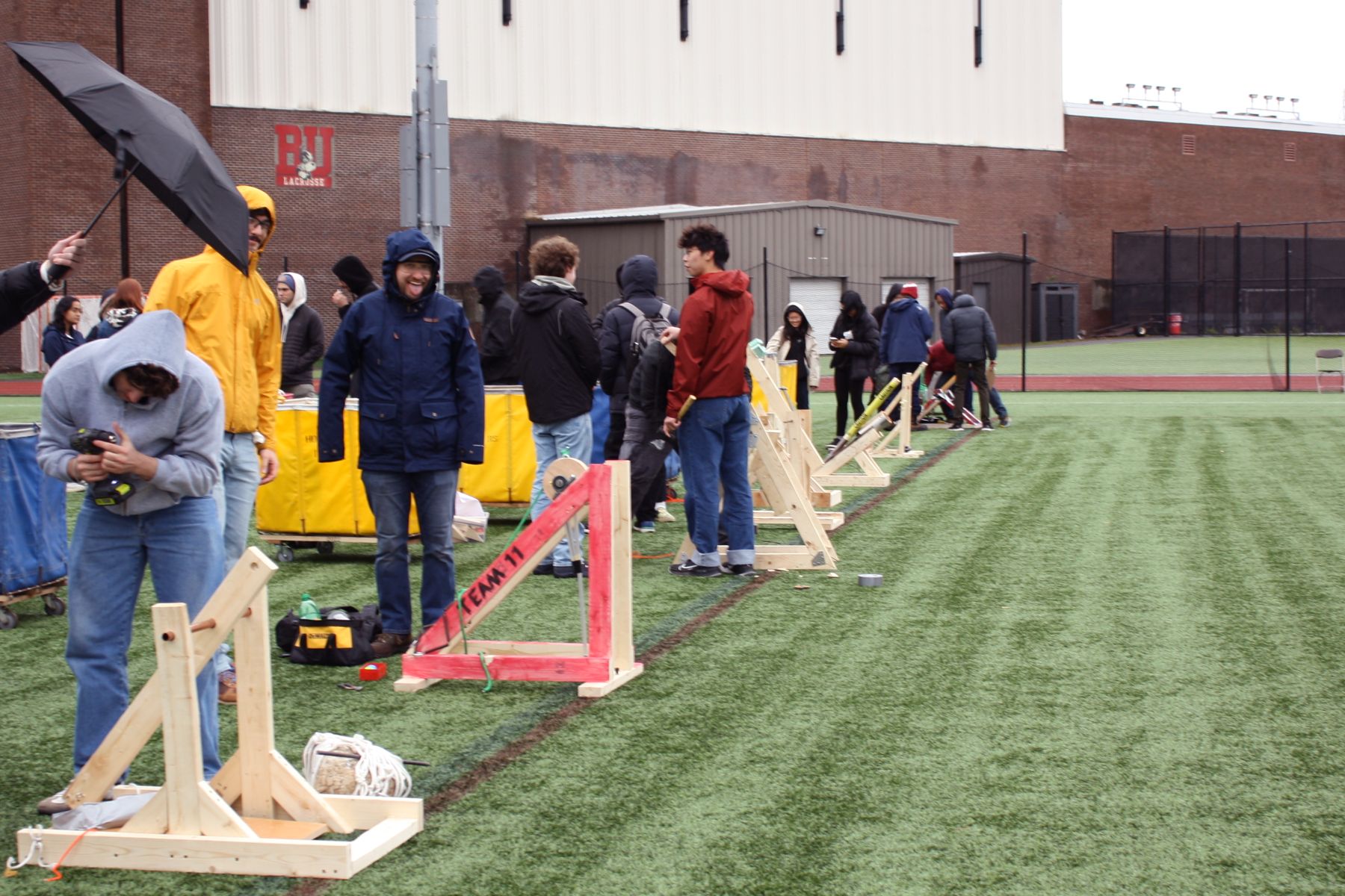 a wide shot of some of the line of catapults during meetings with the judges