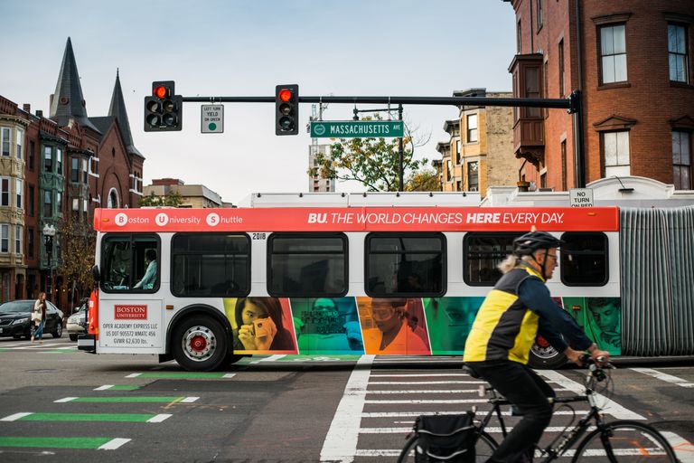 The BU Bus driving down Massachusetts Avenue