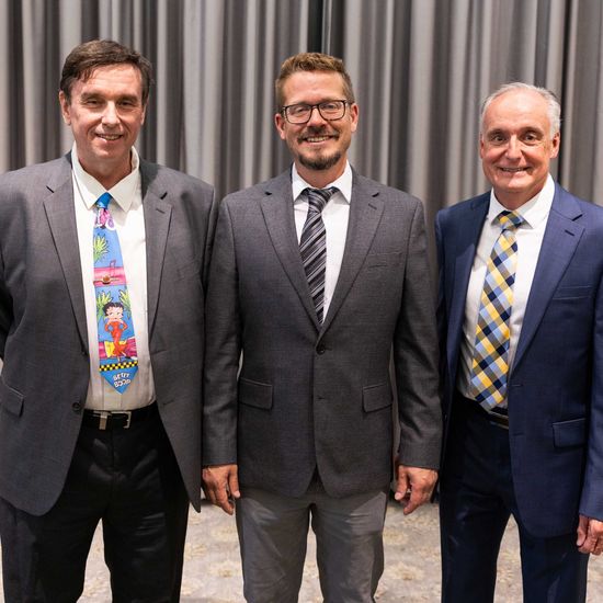 BU Perkins Award Ceremony. Awarded attendees (from left to right) Walter von Bosau, Daniel Ivey, and Richard Vezina (SPH’90) pose for a photograph.