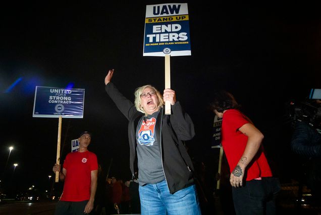 Lisa Sobecki, County Commissioner for Lucas County, Ohio, joins members of the UAW and workers at the Stellantis Toledo Assembly Complex as they picket outside of the plant, many after walking off the job at midnight on Friday, Sept. 15, 2023 in Toledo.