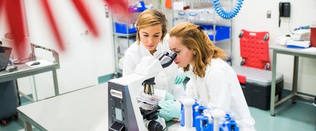 PhD Candidate, Whitney Manhart (BUSM 20) and Research Technician, Jennifer Pacheco pose for a photo at NEIDL on August 24, 2018. They are working with Dr. Elke Muhlberger on LLOV, a filovirus related to Ebola.