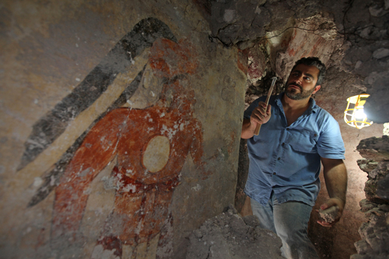 Archaeologist William Saturno, Younger Brother Obsidian 9th century A.D. painting at Maya city house, Xultun, Mexico