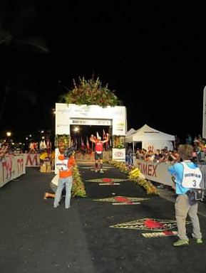 Ironman Woodrow Freese crossing the finish line Woodrow Freese, Ironman Triathlon Kona Hawaii, Boston University BU associate director of residence life reslife