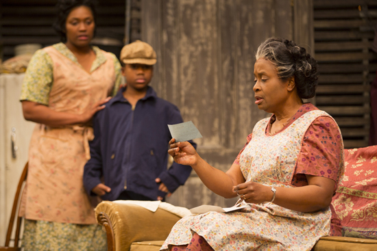 A Raisin in the Sun by Lorraine Hansberry, Ashley Everage, Corey Janvier, Kimberly Scott Ashley Everage as Ruth Younger, Corey Janvier as Travis Younger, Kimberly Scott as Lena Younger, A Raisin in the Sun by Lorraine Hansberry, Huntington Theatre Company
