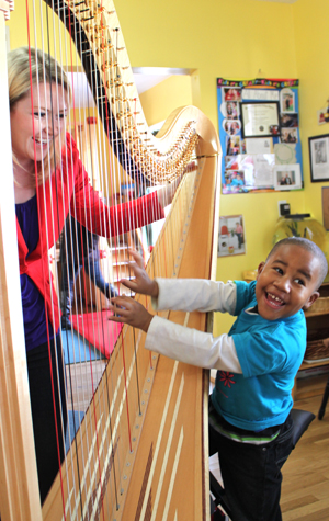 Bosotn University BU, harpist Meghan Caulkett alum, College of Fine Arts CFA, citizen artist, Esprit magazine, 47 strings, Houston Texas House of Tiny Treasures
