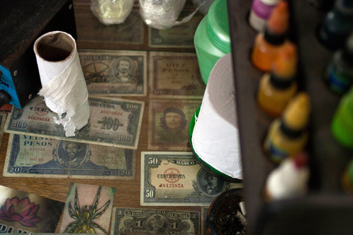 Work station of Cuban tattoo artist Sosa Santana, Havana work station of Cuban tattoo artist Sosa Santana, Havana, Cuba, photography by Stacey Rupolo