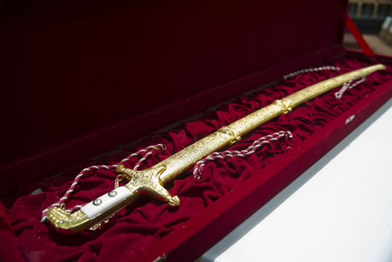 Scarlet Key, gold and diamond encrusted sword Boston University, BU, Scarlet Key, induction ceremony, gold diamond sword