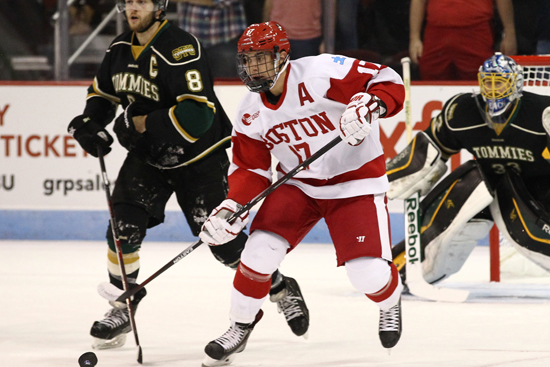 Evan Rodrigues (SMG’15), one of the senior captains on the men’s hockey team, in a recent exhibition game against St. Thomas. Photo by Jim Pierce