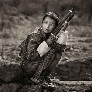 Young Boy at Religious Festival, Bhutan, 2010. Photo by Dana Gluckstein