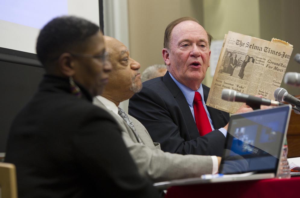 Reverend Dr. Pamela Lightsey, BU School of Theology Associate Dean of Community Life and Lifelong Learning, from left, Reverend Dr. William Bobby McClain (STH ‘62, STH ‘77), and Dr. Don Messer (STH ‘66, GRS ‘69) were panelists for the discussion Selma at 50: Ferguson at STH. McClain and Messer, who is holding up a local paper from 1965, traveled with a group of STH seminary students to Selma, Alabama in 1965 to participate in the March to Montgomery led by Martin Luther King, Jr. (STH ‘55). Photo by Cydney Scott