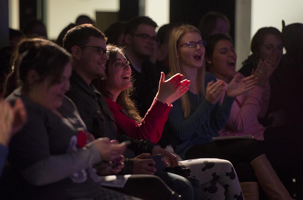 The crowd, which included Arianna Davis (CAS'18), center, shows their support during the Student Activities Presents: BU's Funniest 2015 preliminary round at BU Central March 19, 2015 at BU Central. Photo by Cydney Scott