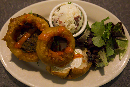 Meat lovers are sure to fall for Veggie Galaxy’s  Kendall Square burger, which comes crowned with thick-cut, beer-battered onion rings and a choice of house-made sauces.