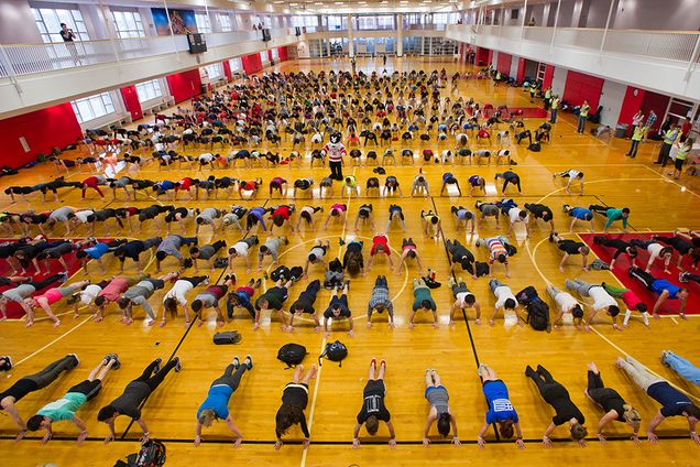 Boston University students attempt to set a new world record for the number of people doing pushups at one time at the BU Fitness and Recreation Center