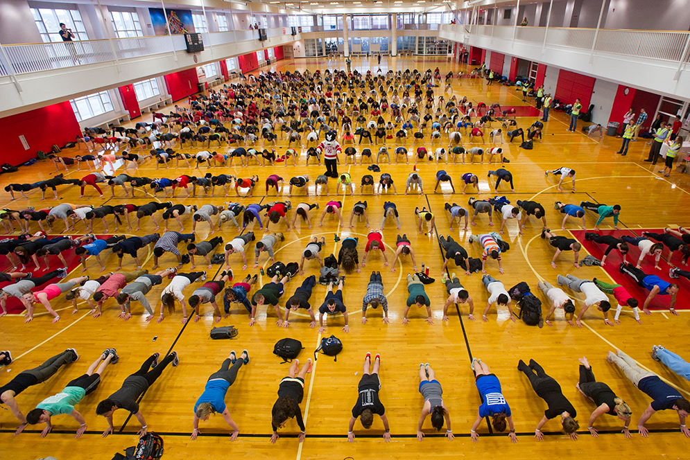 Boston University students attempt to set a new world record for the number of people doing pushups at one time at the BU Fitness and Recreation Center