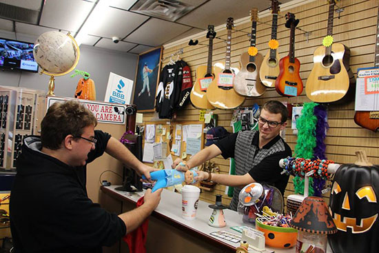 customer (Nicholas Frasso, CAS’15) and a pawnbroker (Jack Wall, COM’15) argue over the price of an item in a sketch parodying the reality show <em>Pawn Stars</em> on BUTV10’s <em>Pals & Friends</em>. Photos courtesy of <em>Pals & Friends</em>