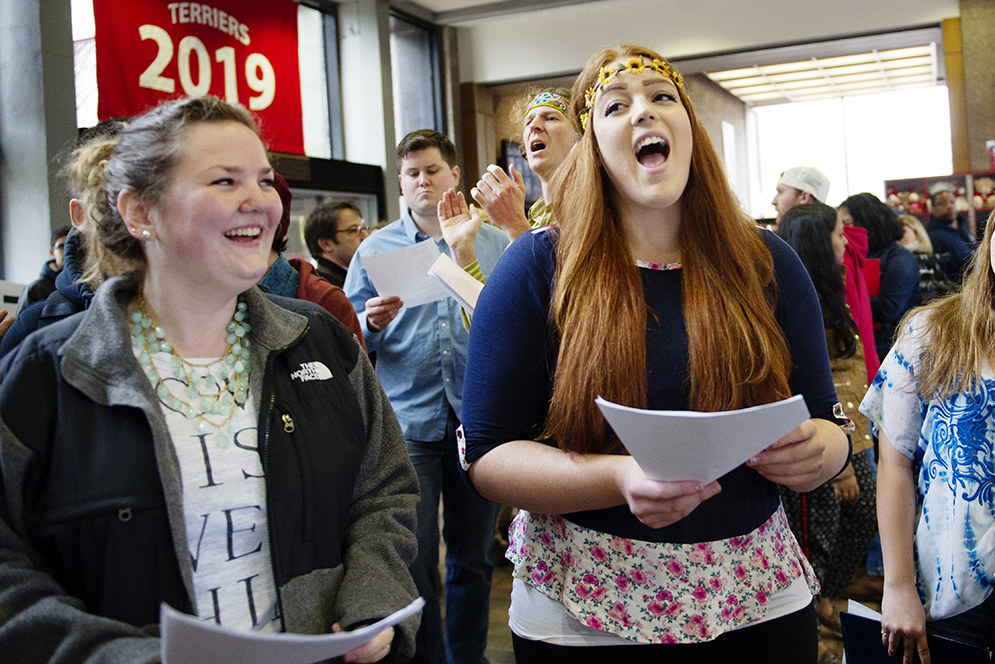 Becca White, left (CFA 15) and Leanne Ciccone (SED 16) participate in a Beatles event at the GSU on Friday, April 10, 2015. CFA students put together the event to mark the 45th anniversary of the date the Beatles split up. Photo by Jackie Ricciardi