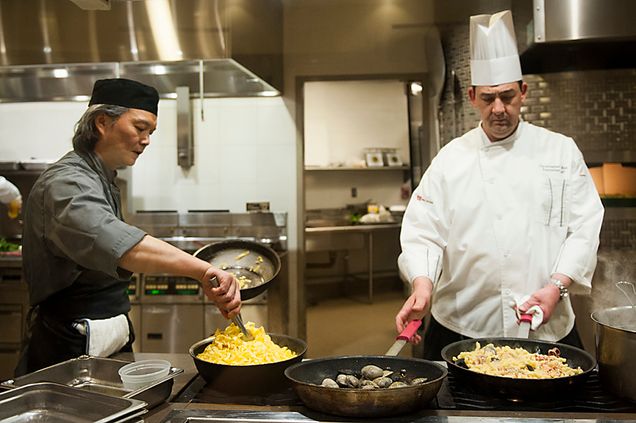Chefs Sammy Liao (left) and Chris Bee prepare their dishes for a test run of tonight's Visiting Chef Series. Late Night Kitchen, 100 Bay State Rd. Photo by Esther Ro (COM'15)