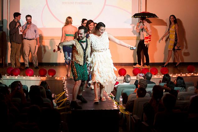 Michael Parello (SAR'15) (left) and Jasmine Elbarbary (CAS'15) show off in the Partners in Health Engage "Condom Couture" HIV/AIDS Fundraiser and Fashion Show. Featured 10 designers representing various groups on campus. Over 100 people attended the event held at Jacob Sleeper Auditorium. Photo by Esther Ro (COM'15)