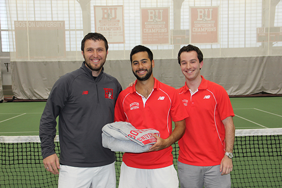 Men’s tennis head coach Dejan Stankovic (left), Emilio Teran (ENG’15) and assistant coach Jesse Frieder honor Teran during the team’s annual Senior Day prior to their 7-0 win over Holy Cross on April 1. Teran is the only senior on this year’s team.