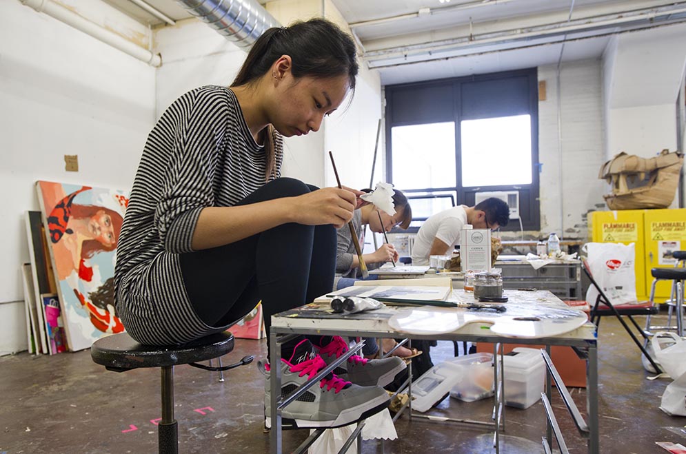 Lan Sun (COM'17) focuses on her value scale painting during Eka Maraneli's Intro to Painting course 
